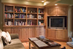 View of carved corbels with bronze foot rests on breakfast bar